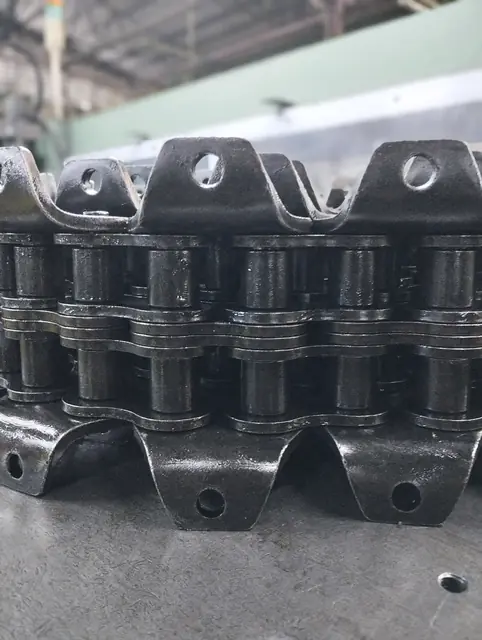 Multi-strand chain with attachments